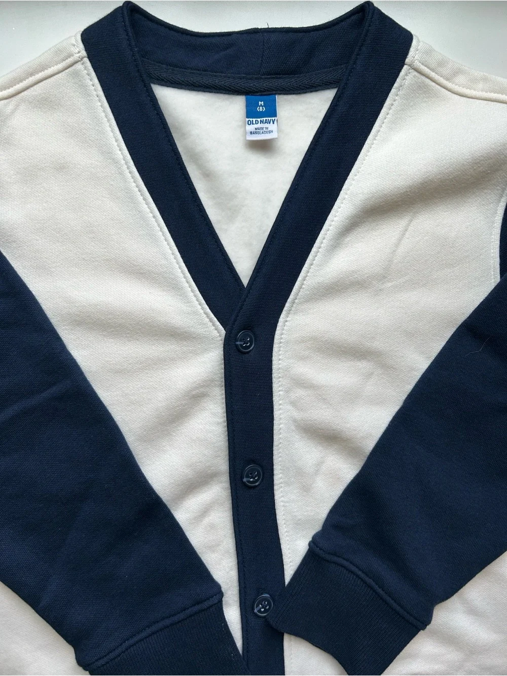 Kid’s Y2K-Inspired Two-Tone Navy and Cream Cardigan Sweater